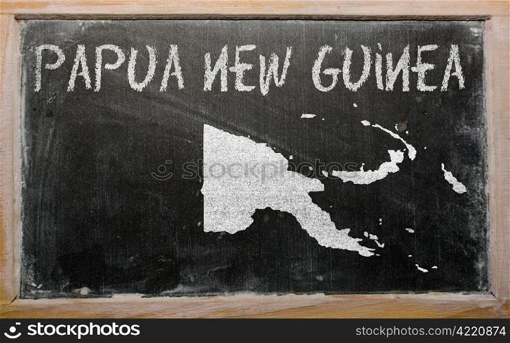 drawing of papua new guinea on blackboard, drawn by chalk