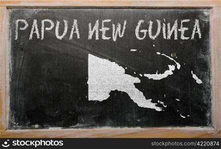 drawing of papua new guinea on blackboard, drawn by chalk