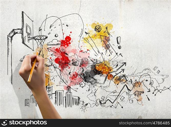 Drawing sketches. Close up of human hand drawing conceptual sketches