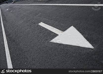 Drawn arrow on a lane.