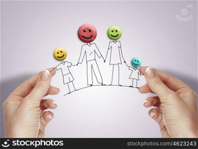 Drawn family concept . Human hands and drawn happy family concept