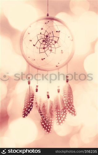 Dream catcher and abstract bokeh background