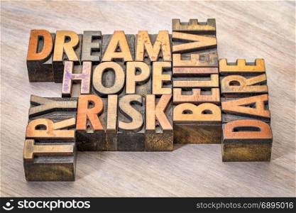 dream, hope, believe, dare, risk and try - inspirational word abstract in vintage letterpress wood type printing blocks