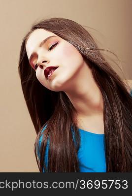 Dreaminess. Portrait of Sensual Dreaming Brunette with Straight Brown Hair