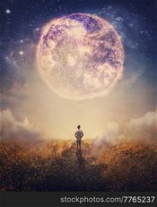 Dreamy scene with a person walking a pathway with the view to the fantastic cosmic sky. Surreal scene of adventure concept. Following a magical nebula