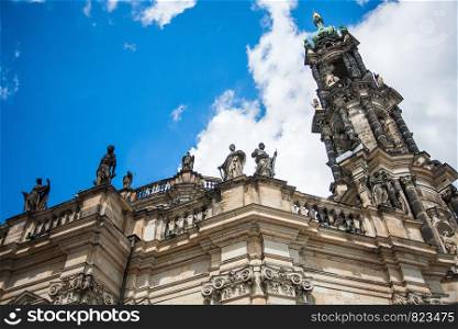 Dresden, Germany in a beautiful summer day. Historical and cultural center of Europe. Cathedral of the Holy Trinity aka Hofkirche Kathedrale Sanctissimae Trinitatis. Dresden, Germany in a beautiful summer day. Historical and cultural center Europe.