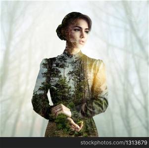 Dress and body of young woman with green forest texture, double exposure effect. Blur trees on background