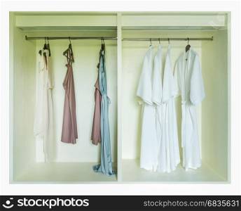 dressing gown hanging in a white wardrobe