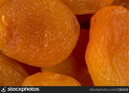 Dried apricots close up macro shot for background