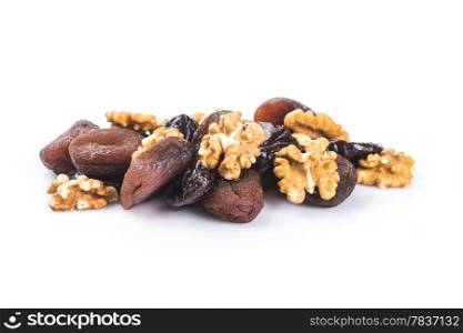 Dried apricots, walnut and plums in a white background
