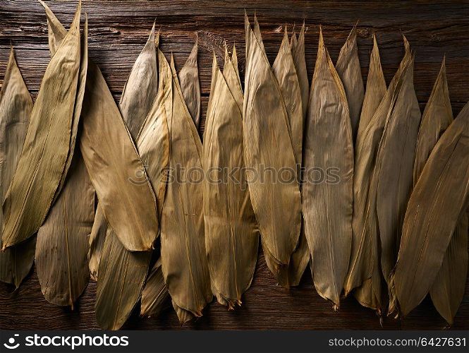 Dried Bamboo leaves in brown for Zongzi asian recipe preparation