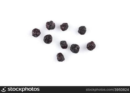 Dried blueberries fruit on a white background