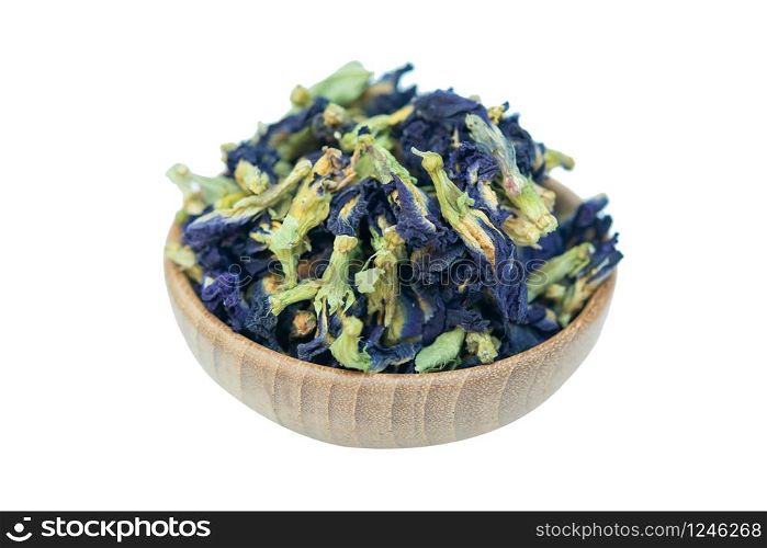 Dried butterfly pea on bowl wood isolated on white background with clipping path