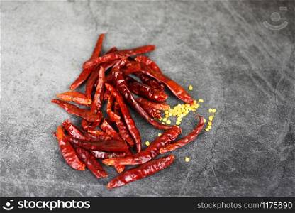 dried chillies on dark background / Red chili pepper seed