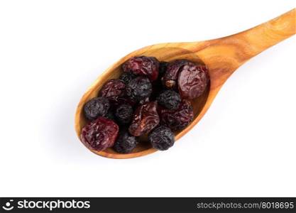 Dried cranberries, cherries and blueberries on white background