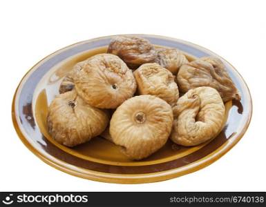 Dried figs on plate isolated over white background