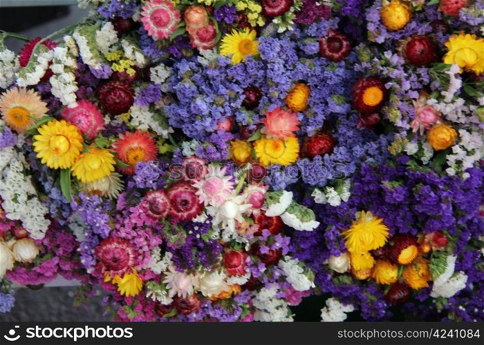 Dried flowers in small bouquets at a market in the Provence