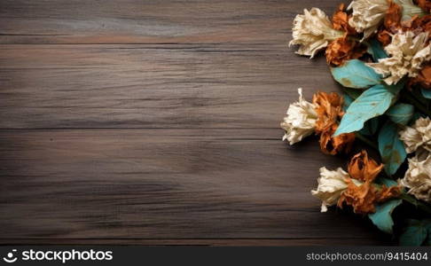 Dried flowers on wooden background with copy space. Top view.