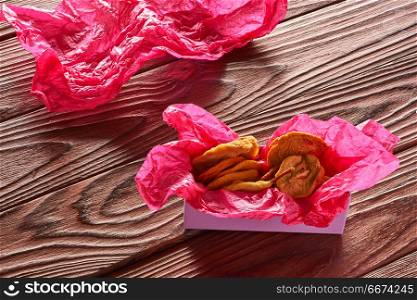 Dried fruits on wooden background . Dried fruits on vintage rustic wooden background