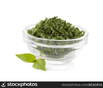 dried green spices in bowl isolated on white background