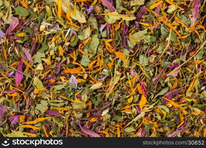 Dried herbal flower tea leaves close up as a background