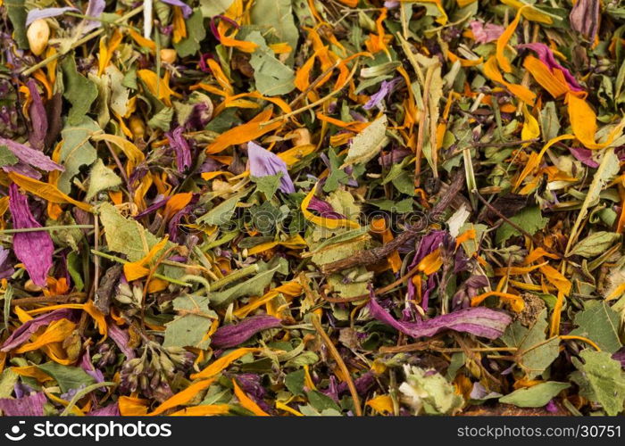 Dried herbal flower tea leaves close up as a background