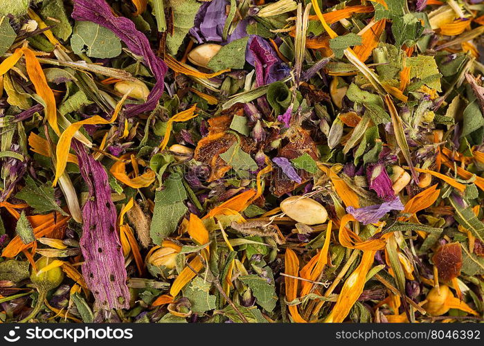 Dried herbal flower tea leaves close up as a background