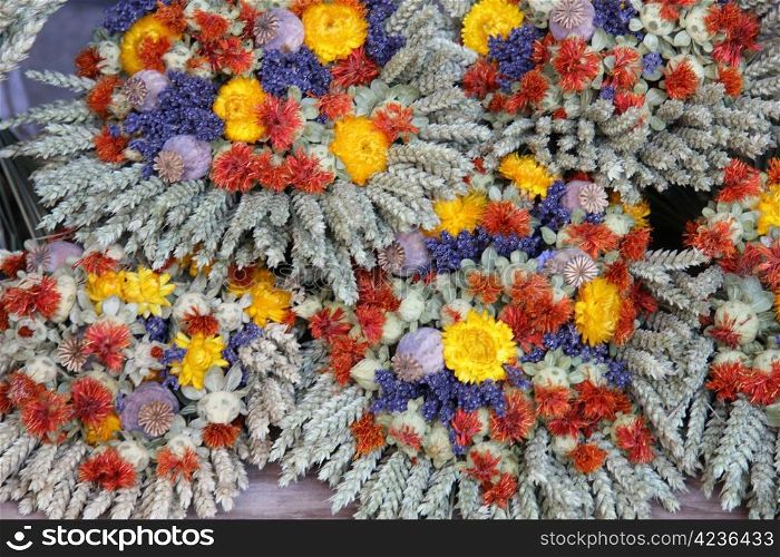 Dried lavender and wheat bouquets, for sale at a local market in the Provence, France