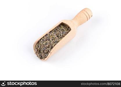 dried lavender organic tea in wooden scoop Isolated on white background