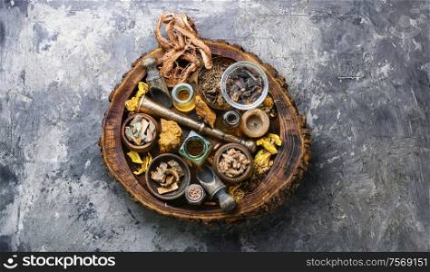 Dried medicinal herbs, plants and rhizomes in wooden tray.Natural medicine. Alternative medicine herbal