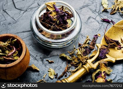 Dried natural basil spice.Dried basil leaves herbs. Pile of dried basil seasoning,natural basil spice