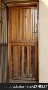 Dried Out Wooden Outside Door Requiring Maintenance