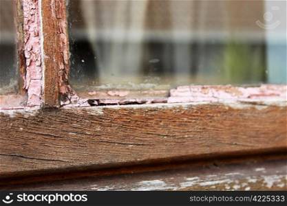 Dried Out Wooden Window Frame Requiring Maintenance
