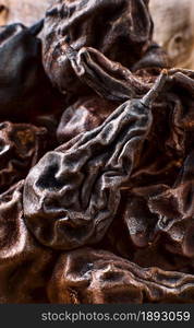 Dried pears, close-up, selective focus. Ingredients for the local swiss dish Birnbrot (literally pear bread)