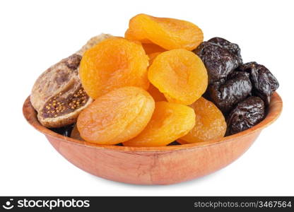 Dried pitted fruits in wooden bowl isolated on white background