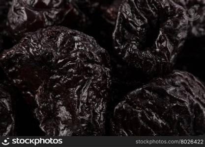 Dried plum - prunes fruits close up for background