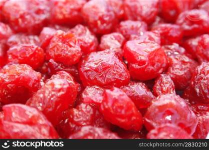 Dried red cherries close up picture.