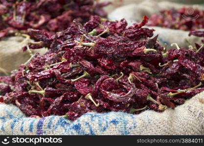 Dried red chili peppers in sacks in India Goa. Dried red chili peppers in sacks in India Goa.