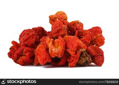 Dried red peppers on the white background