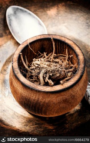 Dried rhizomes and roots of valerian medicinal. Medicinal herbs. Dry root of Valerian