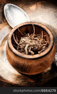 Dried rhizomes and roots of valerian medicinal. Medicinal herbs. Dry root of Valerian