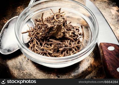 Dried rhizomes and roots of valerian medicinal.Natural herbal medicine. Dry root valerian