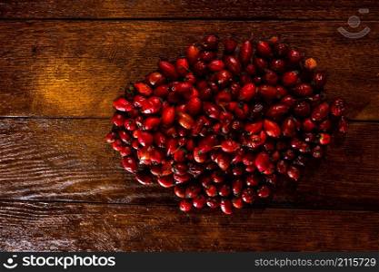 Dried rosehips .Rose hip or rosehip, commonly known as the dog rose (Rosa canina)