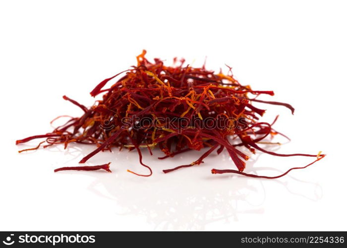 Dried saffron spice isolated on a white background