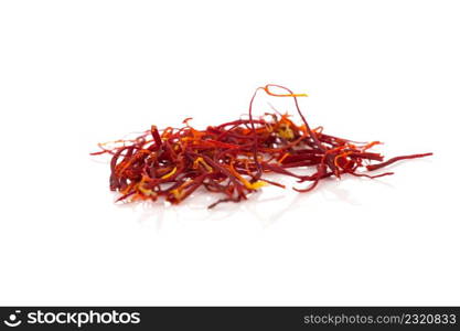 Dried saffron spice isolated on a white background