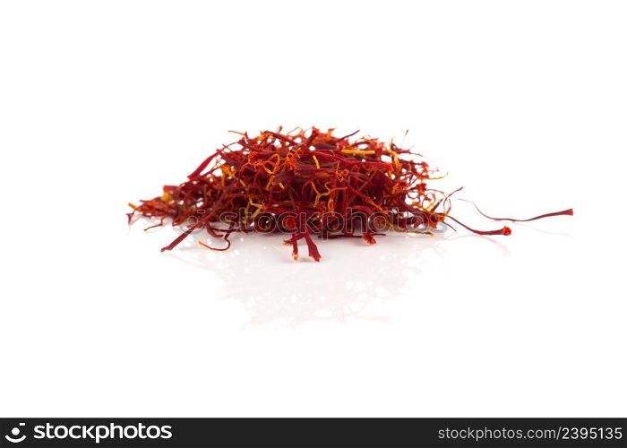 Dried saffron spice isolated on a white background