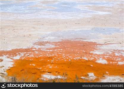 dried saltworks in orange and white textures of Formentera island