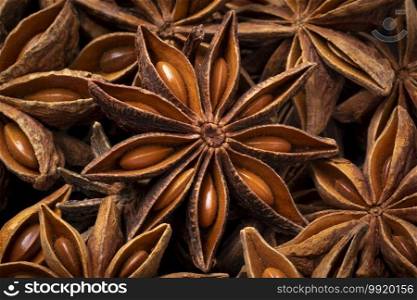 Dried star anise fruit and seed close up full frame
