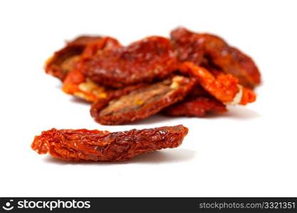 Dried tomatoes isolated on white