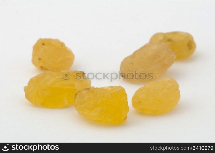 Dried white grapes on a white background